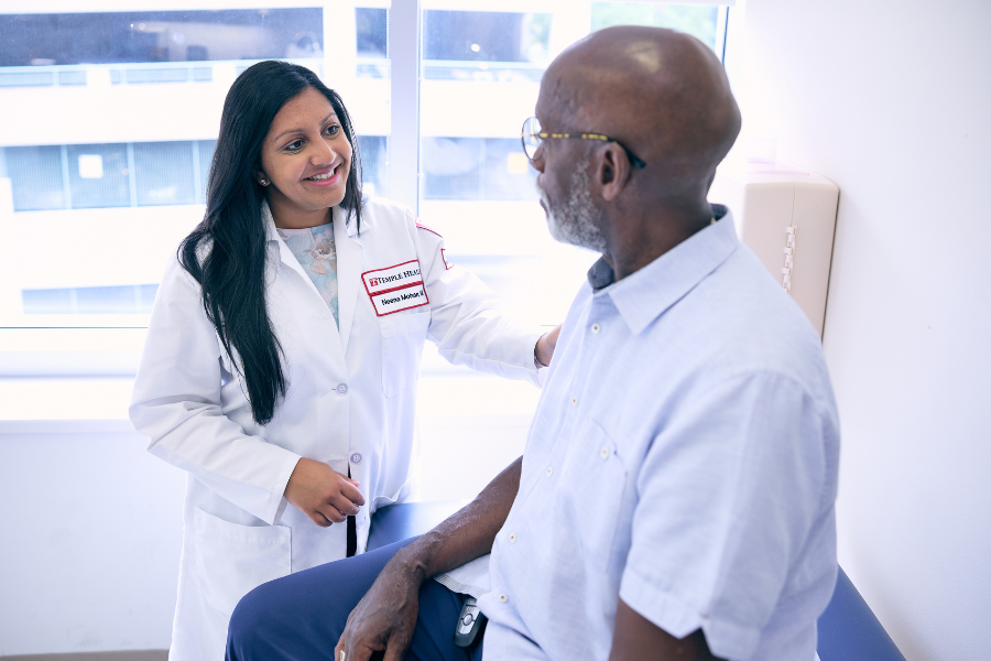 Dr. Mohan with patient