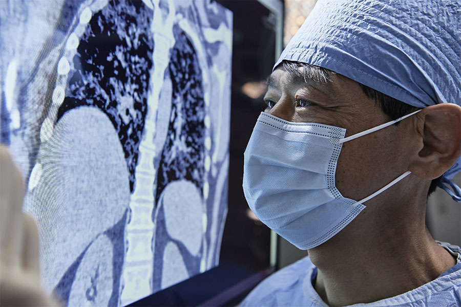 Dr. Shigemura examining a lung scan