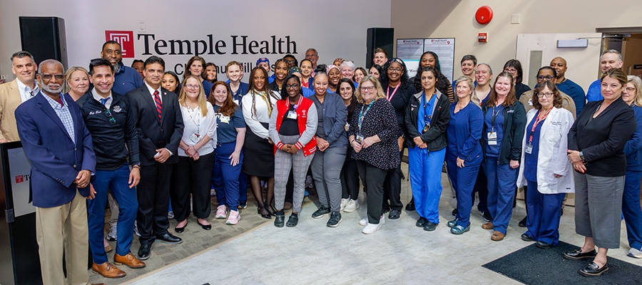 Group gathered in Temple Health - Chestnut Hill Hospital lobby for recognition event.