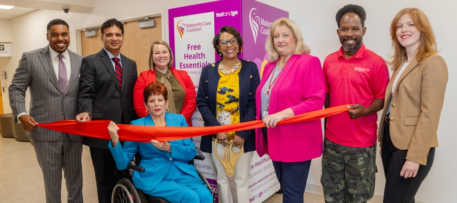 Group photo at ribbon cutting for a community care kiosk at Temple Women & Families Hospital