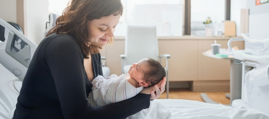 Mother holding newborn baby