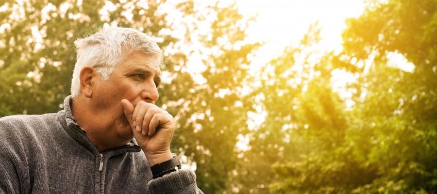 Man coughing outside