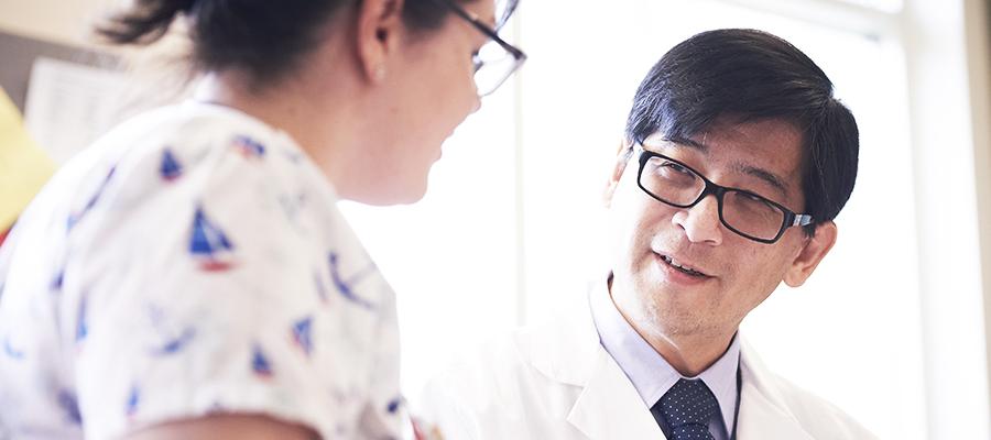 doctor discusses clinical trial