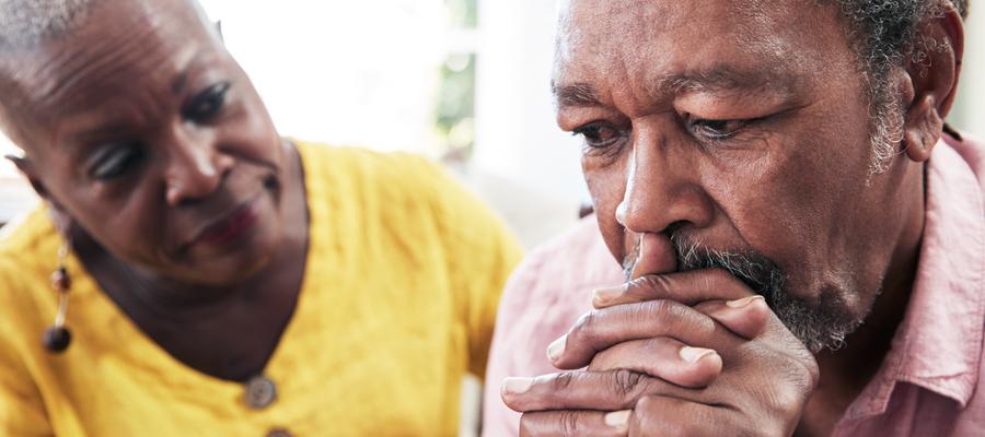 Older man looking concerned