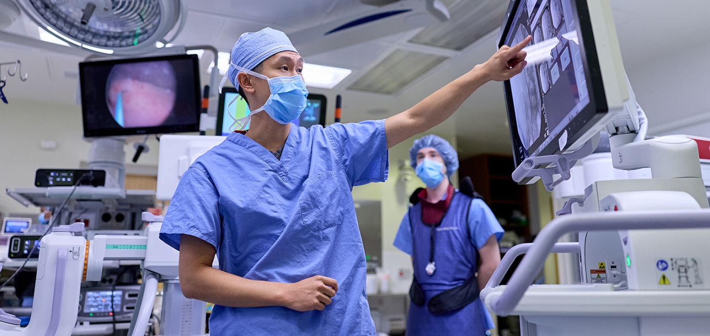 Dr. Lee reviewing urology scan