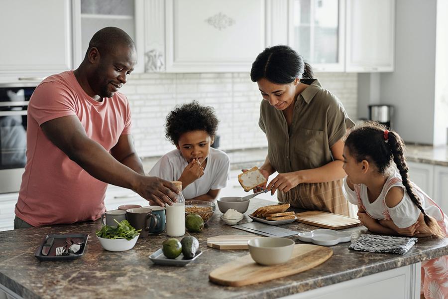 Family cooking together in the kitchen.