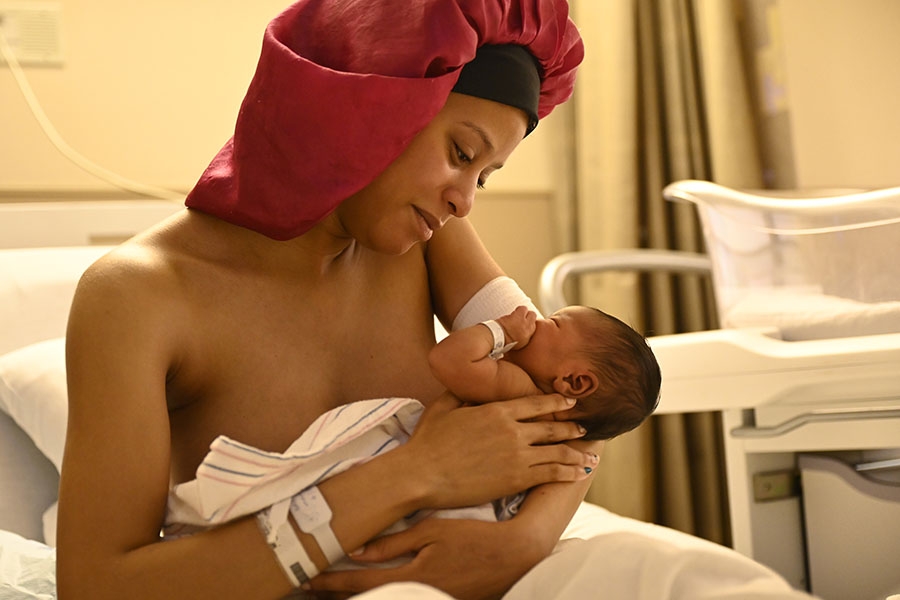 A mom spends precious time with her newborn at TUH-Main Campus.
