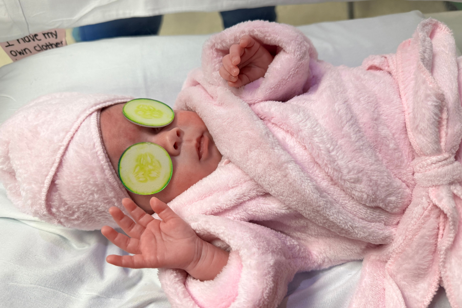 This baby is enjoying their first spa day—and getting a taste for the finer things in life early!