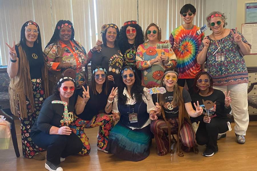 The team shows off their flower power costumes.