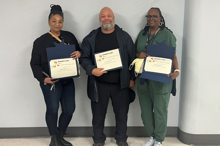 Tanya Cromwell, Derrick Brothers, and Kimberly Bradford with their Crisis Response Center Employee Recognition Awards.