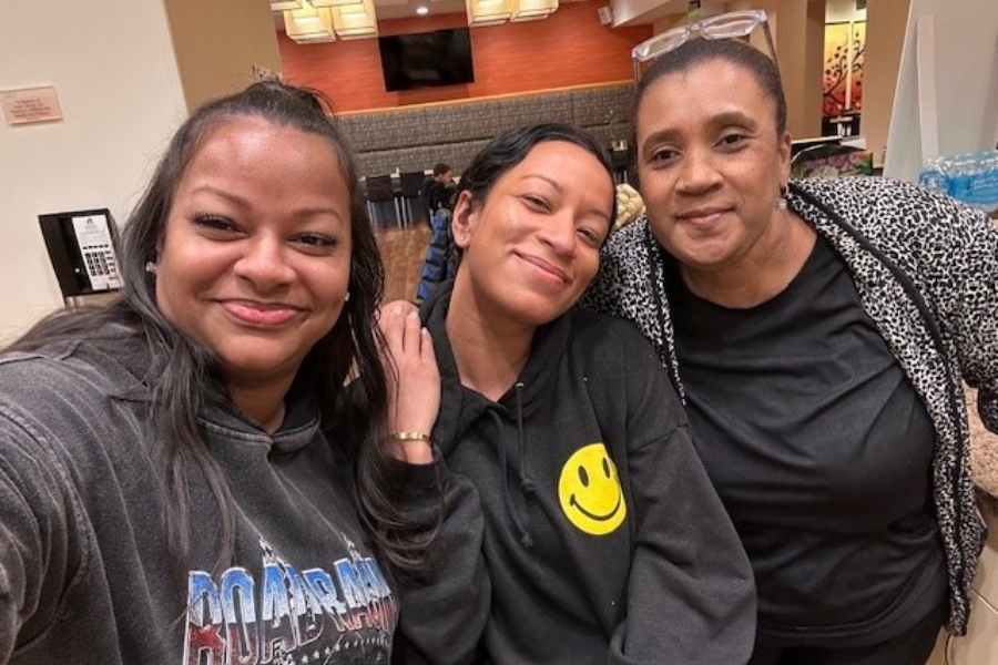 (From left): Neuro ICU Unit Clerk Miodis Monge-Aguilar, Indira Kwaadu, and Marie Ciceron snap a selfie while volunteering at Gift of Life Howie’s House.
