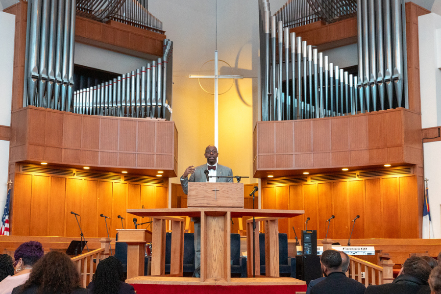 Reverend Major at the pulpit.