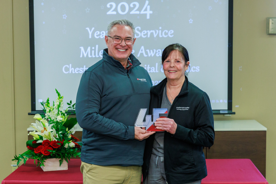 Temple Health-Chestnut Hill Hospital President & CEO Richard Newell, MPT, DPT with CT Technologist Rosemary Kelley, who is celebrating 45 years with Chestnut Hill Hospital. 