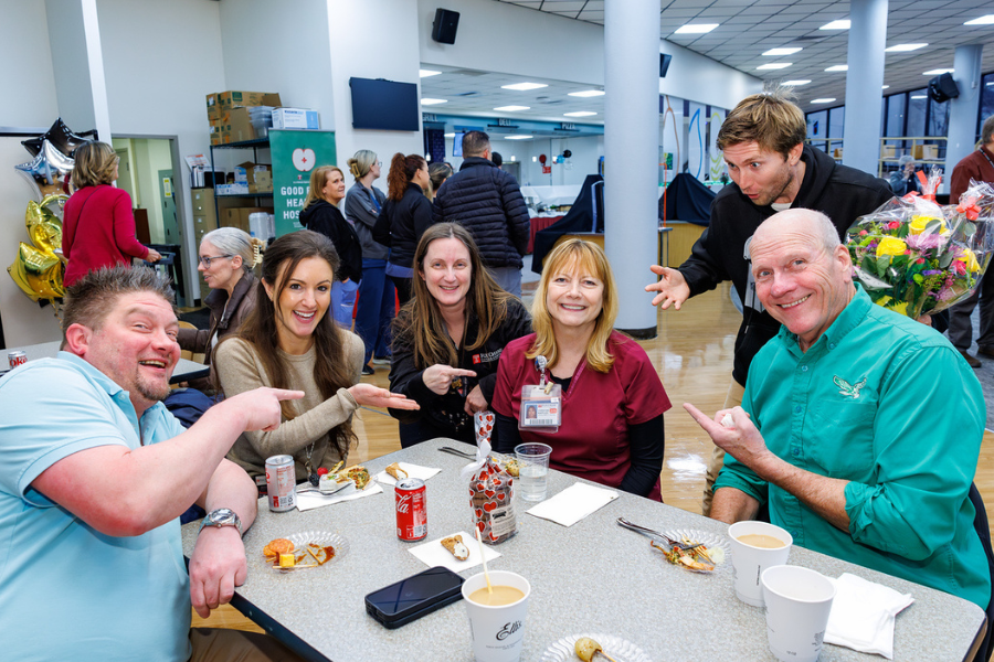 Friends and colleagues celebrate Medical Assistant Christine Kappler’s (center right) 25 years of service at Fox Chase.