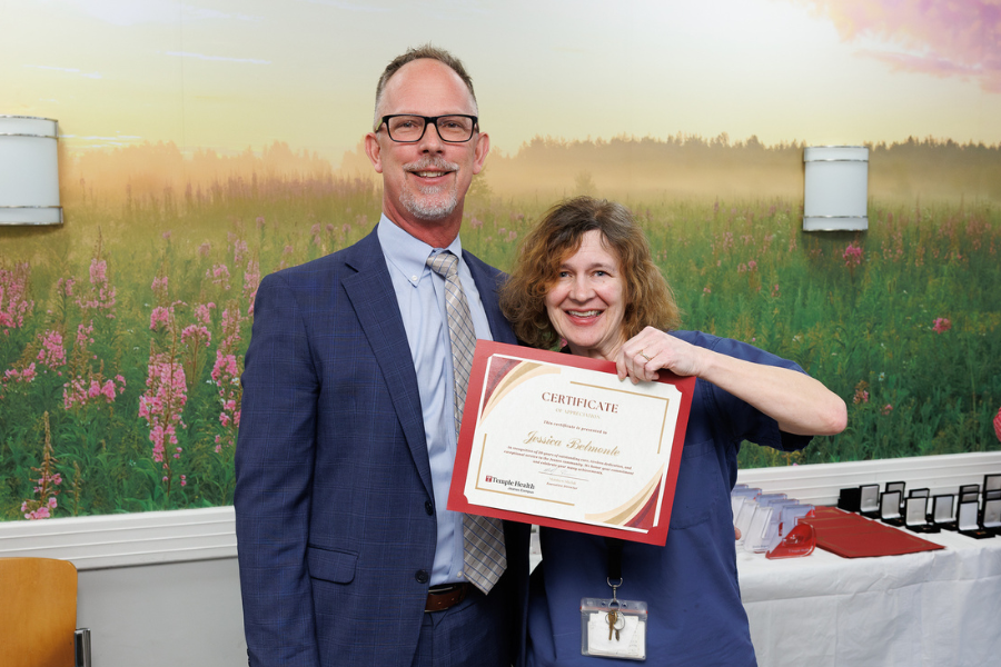 Matthew Shelak, OTR/L, MBA, Executive Director of Temple University Hospital-Jeanes Campus, with Jessica Belmonte, RN, who was honored at the ceremony.