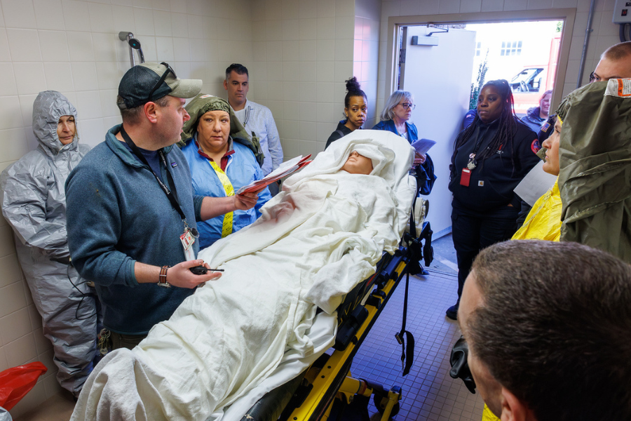 Jeffrey Dever, MSEM, CHEP, TUH-Main Campus’ Manager of Emergency Preparedness, directs the team after the patient has been decontaminated.