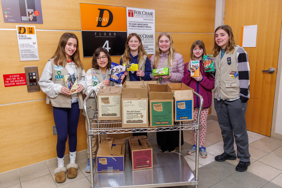 Some of the Girl Scouts from Troop 7511 with their cookie donation.