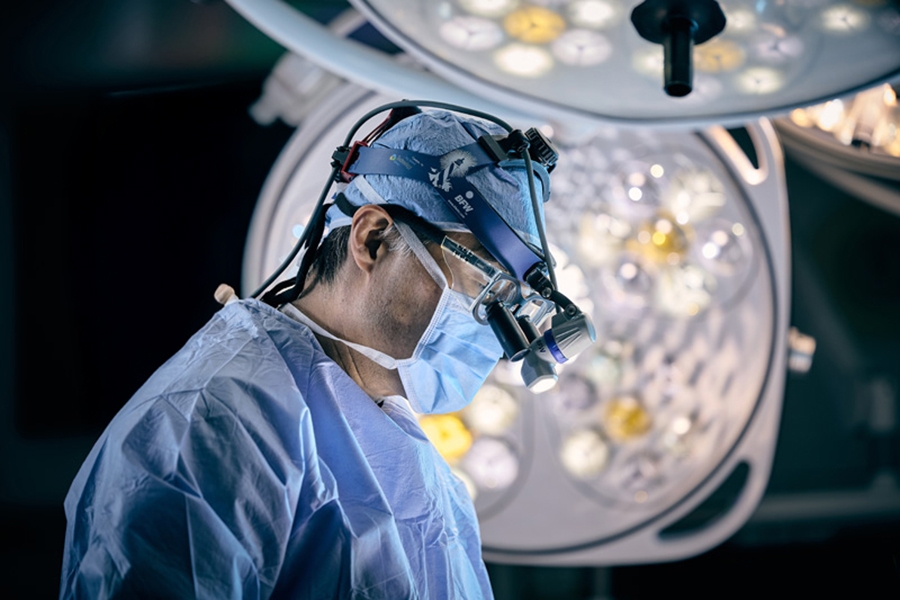 Toyoda performing surgery