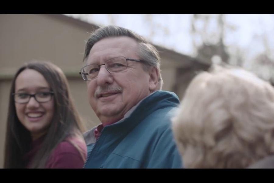 Temple heart transplant patient, Gerry, outside with his wife and granddaughter