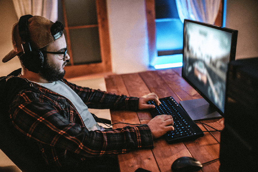 Man playing video games on the computer