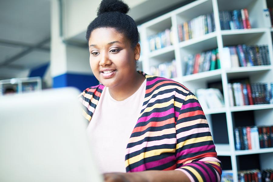 Woman reading on the computer