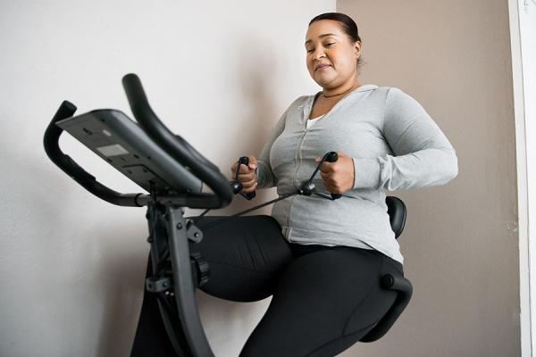 Ingrid exercising on bike