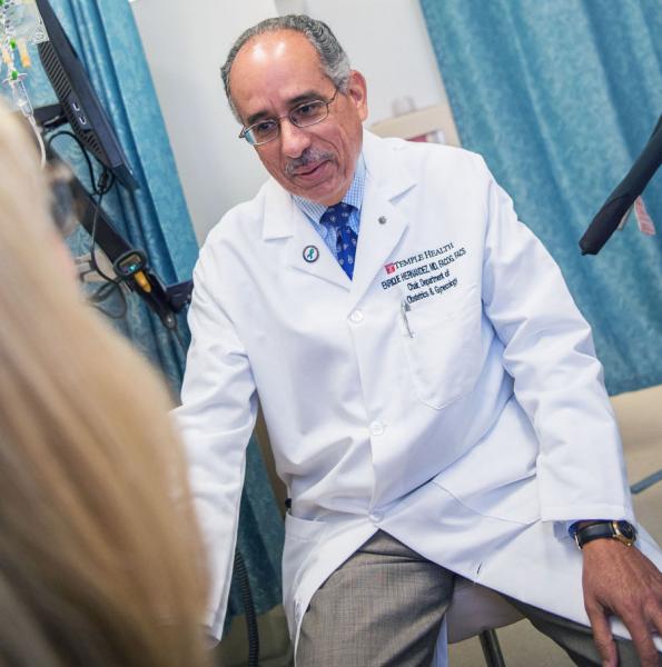 Dr. Hernandez consults with OB-GYN patient