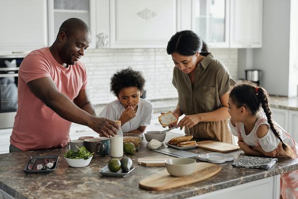 Family cooking together in the kitchen.