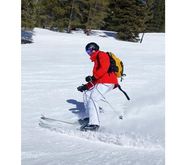 William Rosenau skiing down a slope