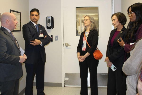 (From left to right) John Robison and Abhi Rastogi give Drs. Debra Bogen, Valerie Arkoosh, and Lakita Davis-Jones a tour. 