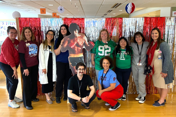 FCCC at TUH staff pose with our life-sized Rocky cardboard cutout