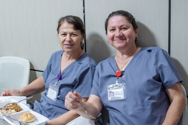 Malahov (right) enjoys an EVS Week celebration with a colleague.