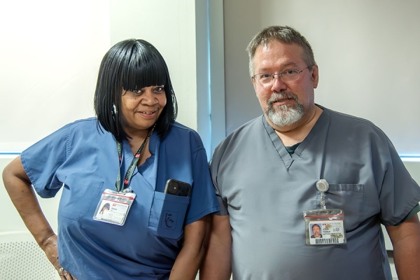 Toska with one of his coworkers