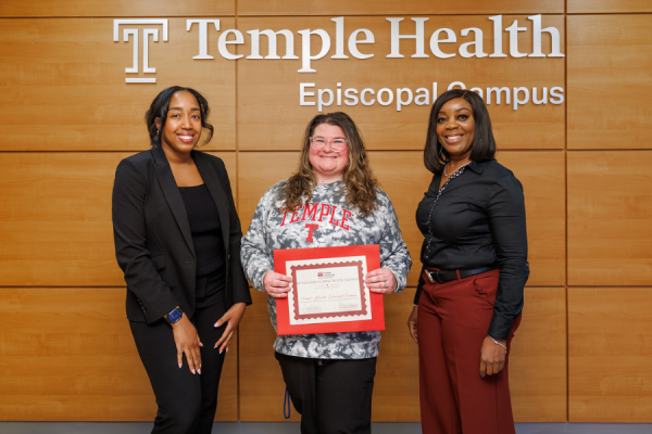 Stinson, Gerhardt, and Williams with the Outstanding Practicum Agency Award.