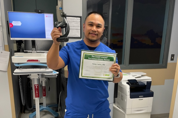 Peter Lemi, RN with his DAISY Award.