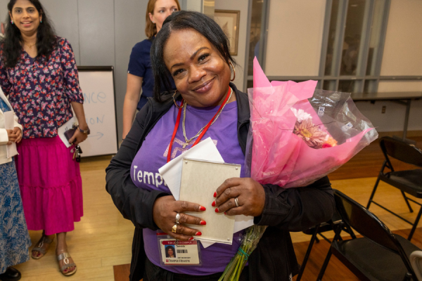 A Jeanes Campus team member with her award.