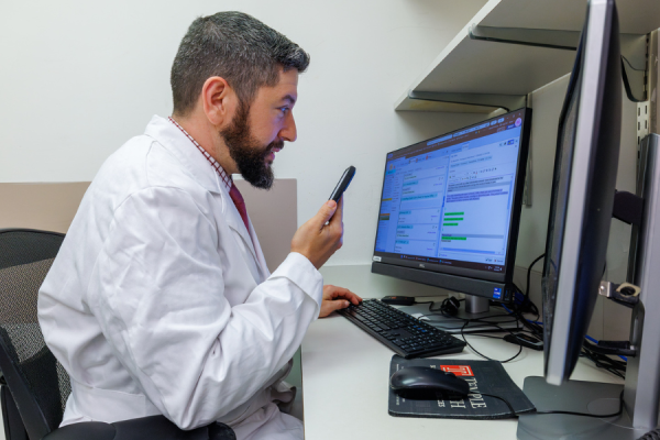 Dr. Slovis reviews the note that DAX generated for him after his patient visit.