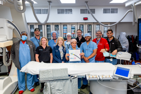The Cardiac Catheterization/Electrophysiology Lab team with the Shockwave Javelin Peripheral IVL Catheter.