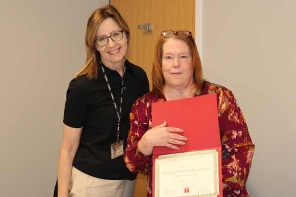 Nicole Ewerth (left) with Frances Faries, Care Transitions Manager.