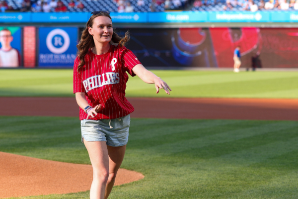 Temple Health patient Lauren Chapple throwing out the Phillies’ first pitch on July 21. Courtesy of the Philadelphia Phillies.