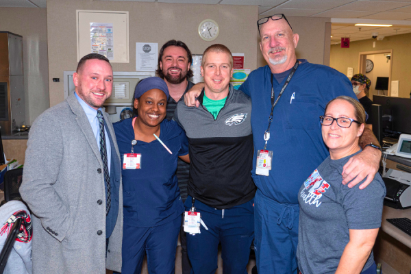 PA State Representative Sean Dougherty (far left) with TUH-Jeanes Campus team members.