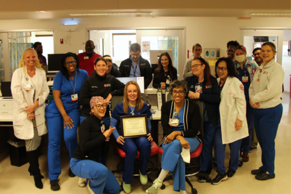 Robinson (center) and her colleagues in the SICU celebrate her achievement.
