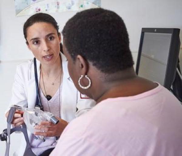 Pulmonologist explaining C-PAP to patient