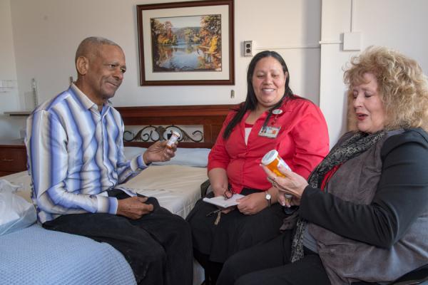 Community health worker with patient
