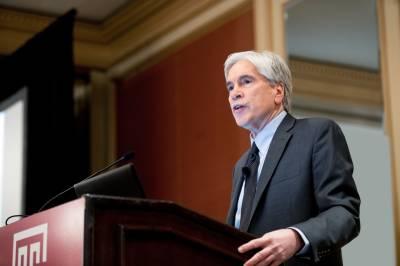 Gerard J. Criner, MD giving a speech at podium 