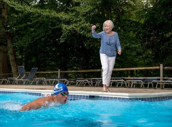 Temple patient, Ginny, cheering on her grandson at his swim meet
