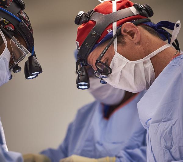 Dr. Michael Weaver treating severe traumatic brain injury patient